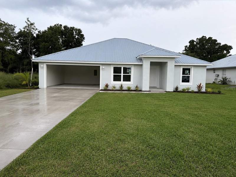4 bedroom Single Family Residence at 23262 Neptune Boulevard, Rainbow Lakes Estate, Dunnellon — photo 2