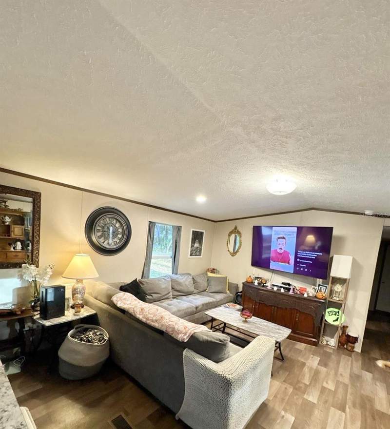 4 bedroom Manufactured Home at 10760 NE 114th Street, University Oaks, Archer — photo 4
