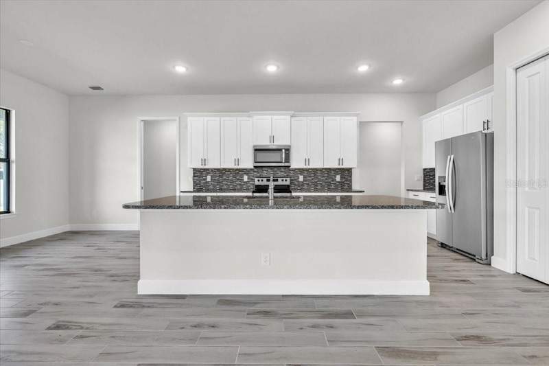 4 bedroom Single Family Residence at 459 NE 2nd Place, Cape Coral, Cape Coral — photo 5