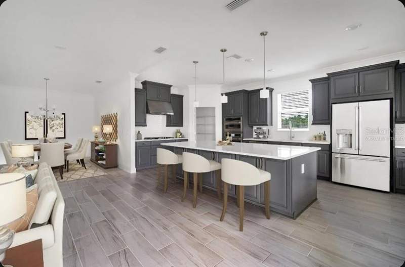 4 bedroom Single Family Residence at 15997 HONEY HARVEST STREET, HARVEST AT OVATION, WINTER GARDEN — photo 5