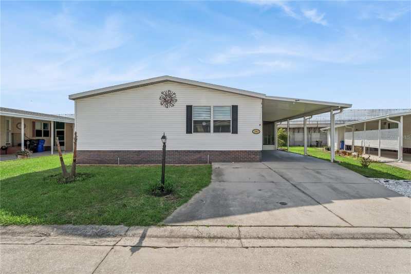 3 bedroom Manufactured Home at 2463 Independence Lane, Teka Village Tr 2 Ph 3, St Cloud — photo 1