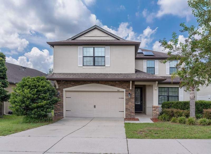 5 bedroom Single Family Residence at 612 Silverthorn Place, Crestridge At Estates, Groveland — photo 2