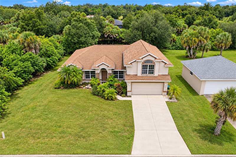 5 bedroom Single Family Residence at 447 Ravenswood Boulevard, Port Charlotte Sec 017, Port Charlotte — photo 1