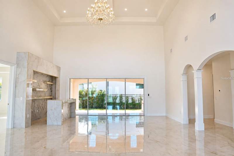 4 bedroom Single Family Residence at 12926 BRUNELLO CIRCLE, TUSCANY ESTATES AT THE LAKES, CLERMONT — photo 4