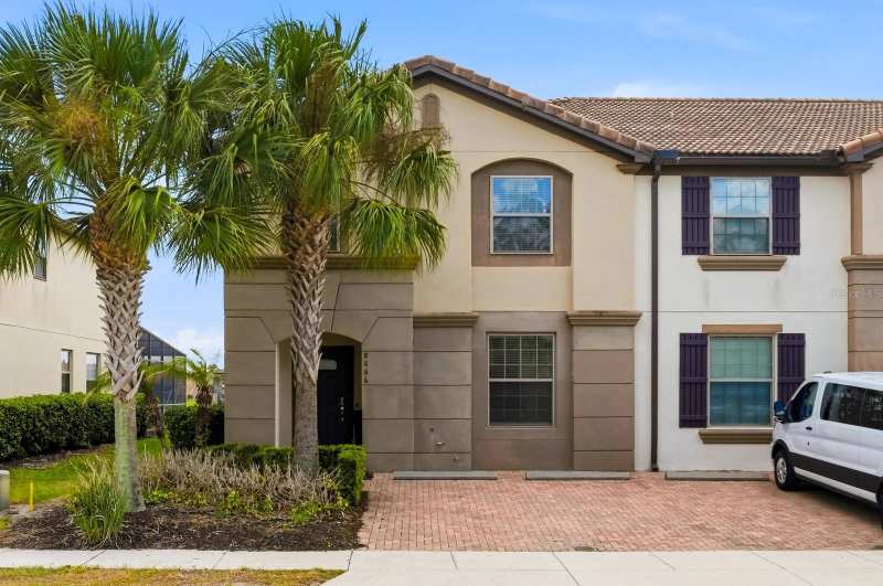 5 bedroom Townhouse at 8866 Geneve Court, Windsor At Westside Ph 2B, Kissimmee — photo 1