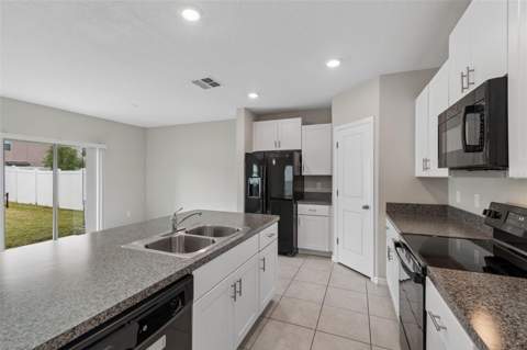 3715 Daisy Bloom Place, Tampa FL - photo 7 of 81