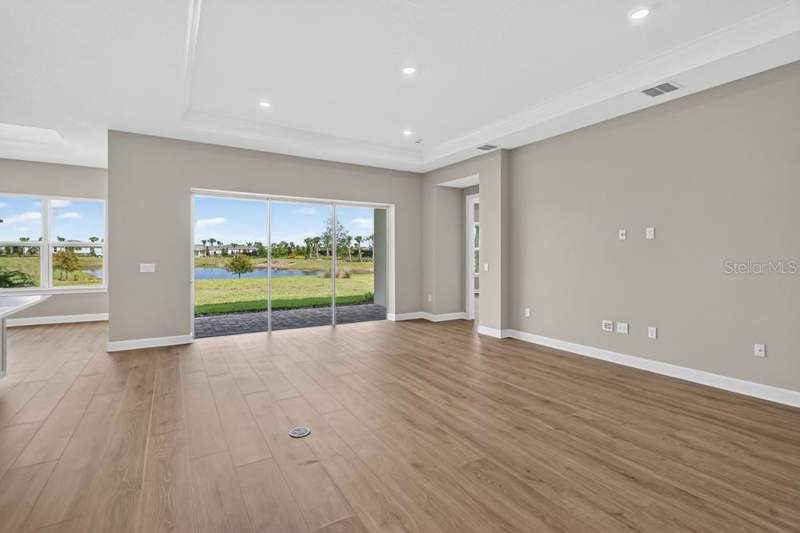 4 bedroom Single Family Residence at 998 TASSLEFLOWER TRAIL, ESPLANADE AT CENTER LAKE RANCH, ST CLOUD — photo 3