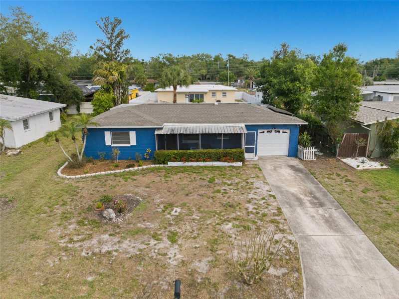 4 bedroom Single Family Residence at 2027 E Valencia Way, Sirmons Orange Blossom Heights, Clearwater — photo 1
