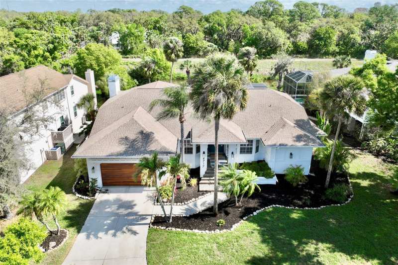 5 bedroom Single Family Residence at 4717 E Trails Drive, Lakes Estates 3 Of Sarasota, Sarasota — photo 1