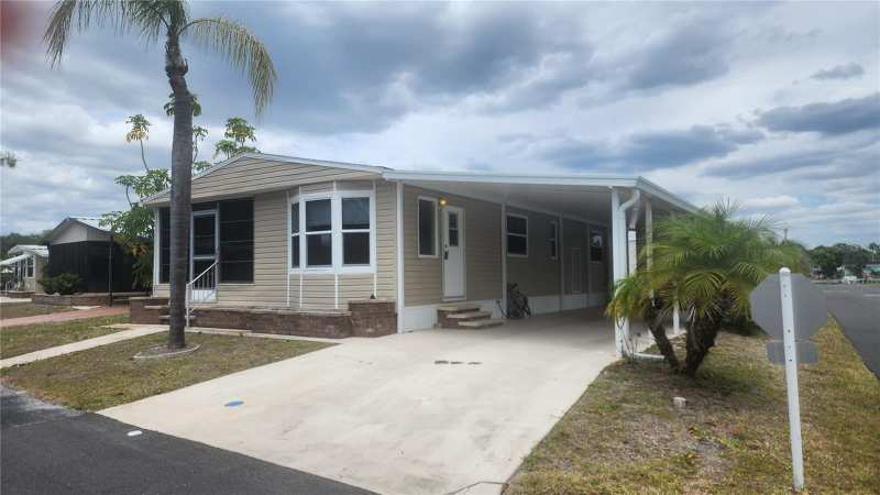 2 bedroom Manufactured Home at 157 N Fiji Circle, Polynesian Village, Englewood — photo 1