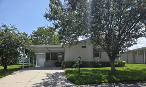 2723 Lake Grassmere Circle #910, home for sale in Zellwood 32798