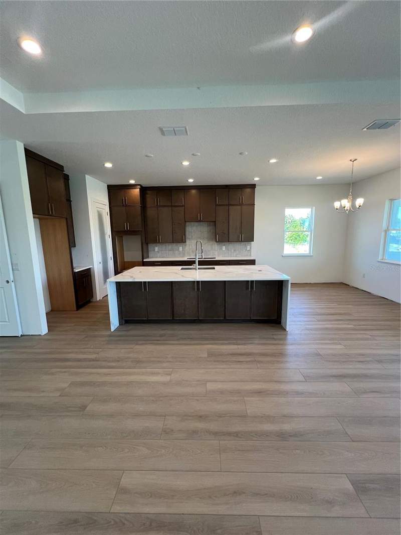 5 bedroom Single Family Residence at 1712 Stonecliff Drive, Bronson Peak, Apopka — photo 4