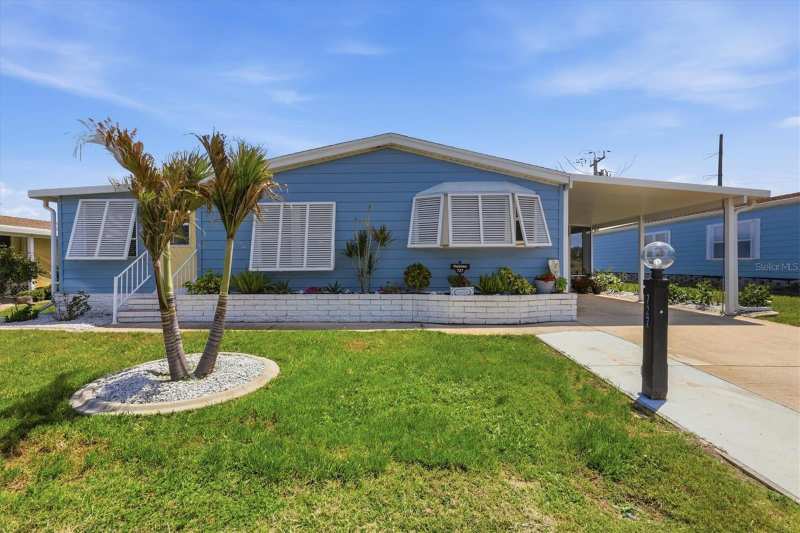 2 bedroom Manufactured Home at 727 Butterfield Circle, Tangerine Woods, Englewood — photo 1