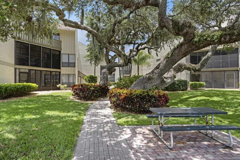 1 bedroom Condominium at 6157 Midnight Pass Road #E22, Bay Oaks, Sarasota — photo 1