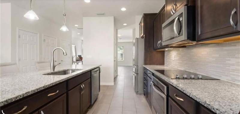 4 bedroom Single Family Residence at 17243 GOLDCREST LOOP, SERENOA VILLAGE 1 PH 1A-1, CLERMONT — photo 5