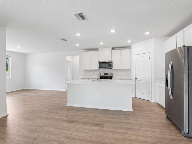 4 bedroom Single Family Residence at 14145 Harvest Pines Lane, Pine Ridge Meadows, Hudson — photo 5