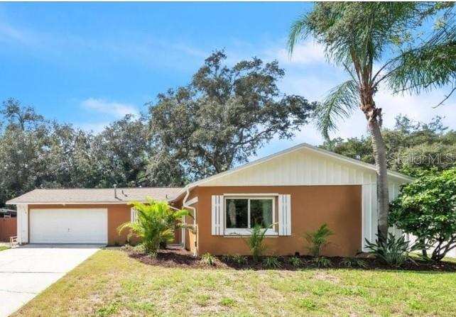 3 bedroom Single Family Residence at 1818 Lillian Avenue, Oakleaf Village, Tarpon Springs — photo 1