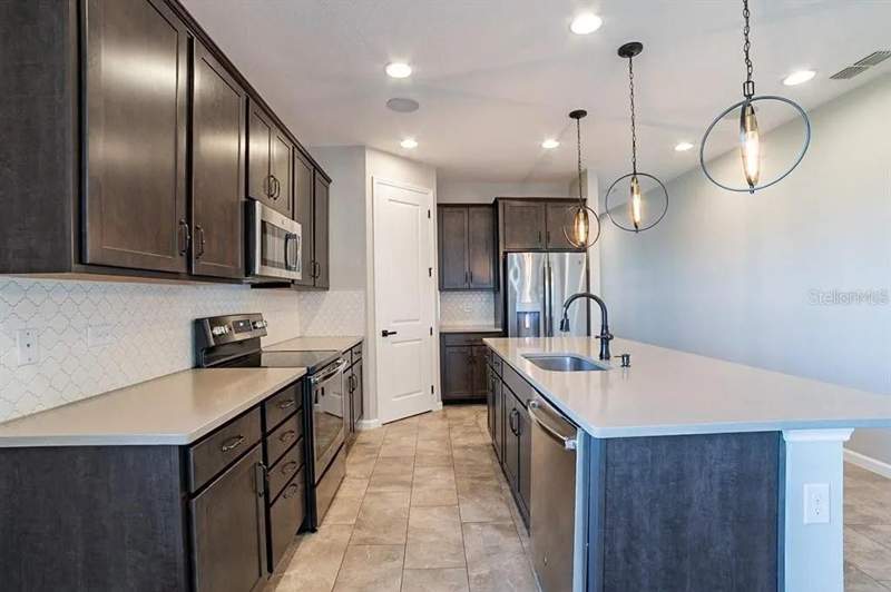 4 bedroom Single Family Residence at 203 Sangmon Court, Groveland Preserve At Sunrise Ph 01, Groveland — photo 2