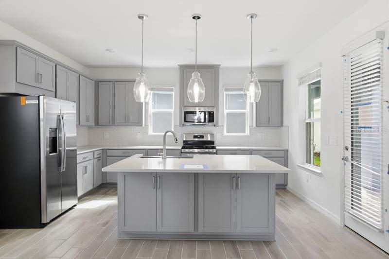 4 bedroom Single Family Residence at 14795 Field Daisy Drive, Harvest At Ovation, Winter Garden — photo 2