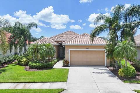 5641 Whispering Oaks Drive, home for sale in North Port 34287