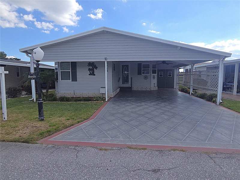 2 bedroom Manufactured Home at 70 Straphmore Drive, Sweetwater Golf & Tennis Club, Haines City — photo 1