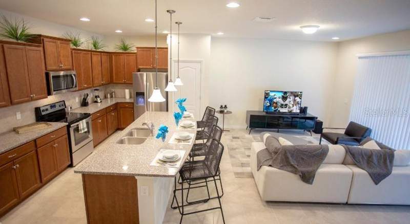 5 bedroom Townhouse at 8879 Geneve Court, Windsor At Westside Ph 2B, Kissimmee — photo 3