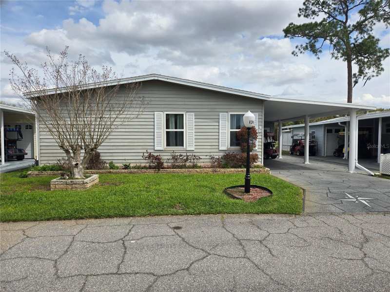 2 bedroom Manufactured Home at 131 Victoria Drive, Sweetwater Golf And Tennis Club, Haines City — photo 1