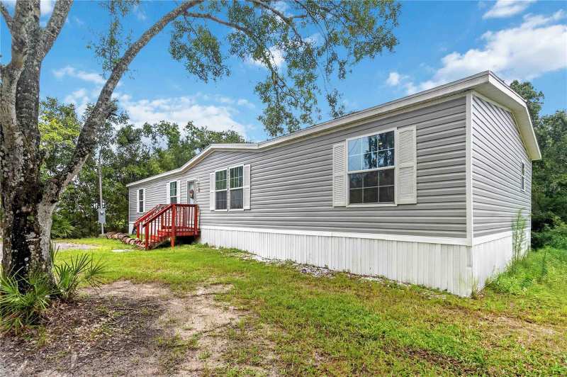 4 bedroom Manufactured Home at 4235 Pine Tree Drive, St Cloud Manor Estates Unit 1, St Cloud — photo 1