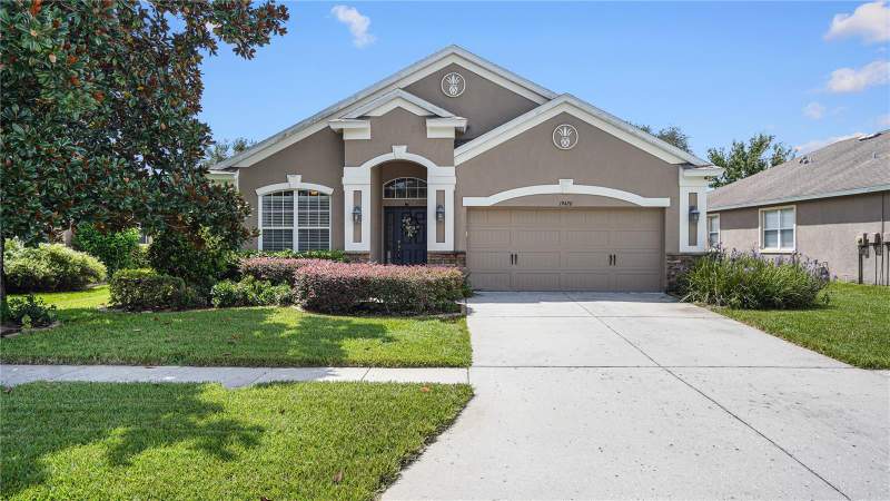 4 bedroom Single Family Residence at 19420 Sunset Bay Drive, Lakeshore Ranch Ph I, Land O Lakes — photo 2