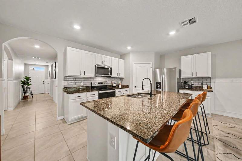 4 bedroom Single Family Residence at 6708 Alder Rd, Villages At Harmony Ph 1B, Harmony — photo 4