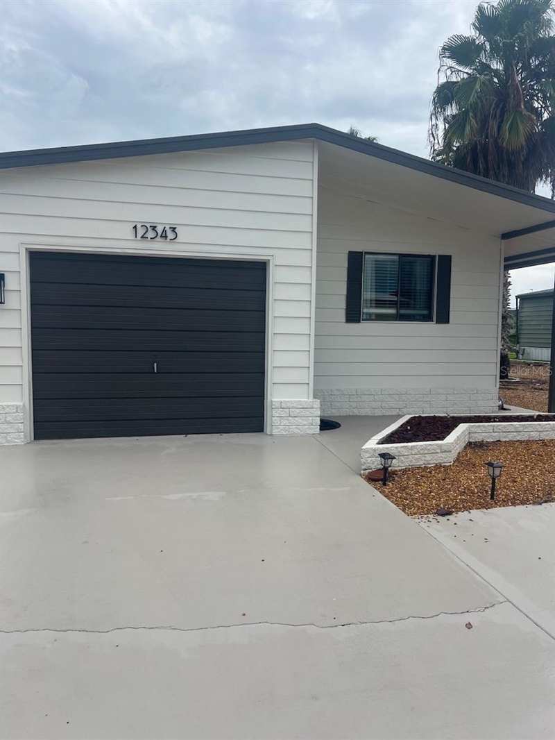 2 bedroom Manufactured Home at 12343 Lariat Way, Ponderosa Park, Hudson — photo 1