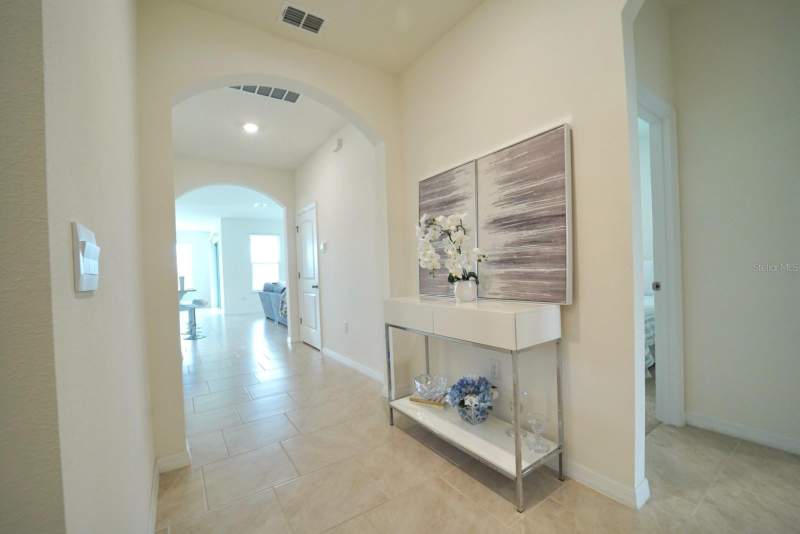 4 bedroom Single Family Residence at 6946 Audobon Osprey Cove, Villages At Harmony Ph 2A, Harmony — photo 4