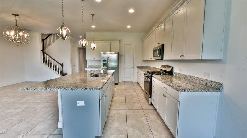 4 bedroom Single Family Residence at 9152 Olmo Court, Magnolia At Westside Ph 2, Davenport — photo 4