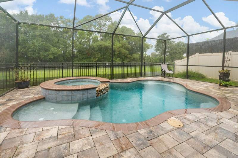 5 bedroom Single Family Residence at 5840 Marmalade Lane, Seminole Groves, Seminole — photo 2