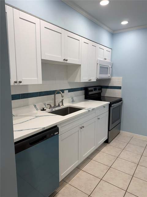 179 Medallion Boulevard #D, Madeira Beach FL - photo 13 of 37