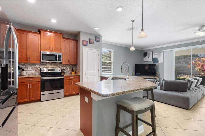 4 bedroom Single Family Residence at 1414 Clubman Dr, Stoneybrook South Ph F-1, Davenport — photo 5