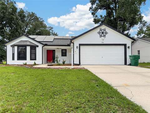 370 Carriage Lane, home for sale in Lady Lake 32159