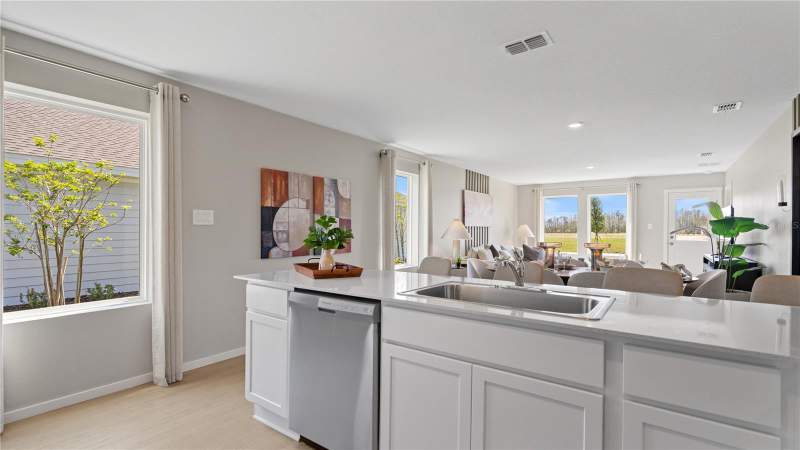 4 bedroom Single Family Residence at 611 CHANNEL WAY, WATERSTONE 40GC, GROVELAND — photo 4