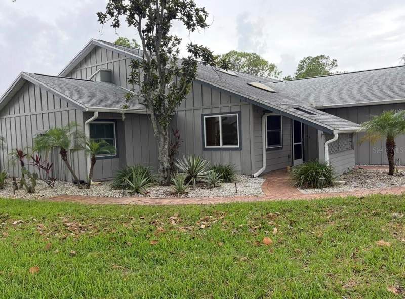 3 bedroom Condominium at 39650 US HIGHWAY 19 #441, WOODS AT ANDERSON PARK, TARPON SPRINGS — photo 1