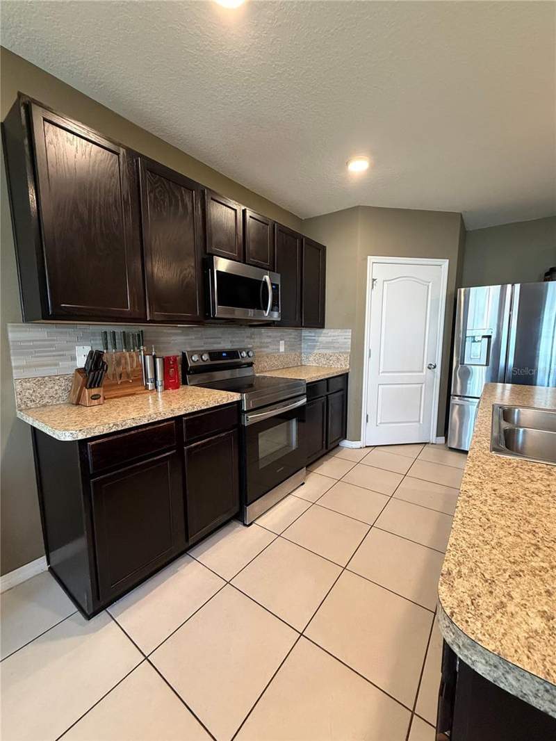 5 bedroom Single Family Residence at 1876 Cassidy Knoll Drive, Kindred Ph 1E, Kissimmee — photo 5