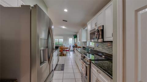 366 Rainforest Court, Oldsmar FL - photo 9 of 65