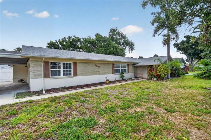 4 bedroom Single Family Residence at 6999 16TH AVENUE, CROSSROADS ESTATES 2ND ADD, ST PETERSBURG — photo 4