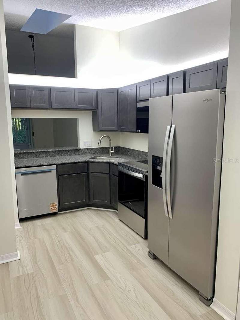 2 bedroom Condominium at 13136 Cypress Hill Drive #125A, Pine Rdg Sugar Crk Village 1 1, Hudson — photo 2