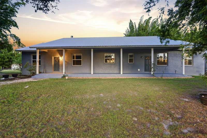 4 bedroom Single Family Residence at 615 Deer Pond Road, Cypress Isles, Osteen — photo 1