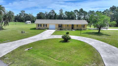 6273 Toronja Drive, home for sale in Indian Lake Estates 33855
