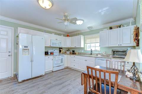 5906 Greenbriar Court, Zephyrhills FL - photo 7 of 38