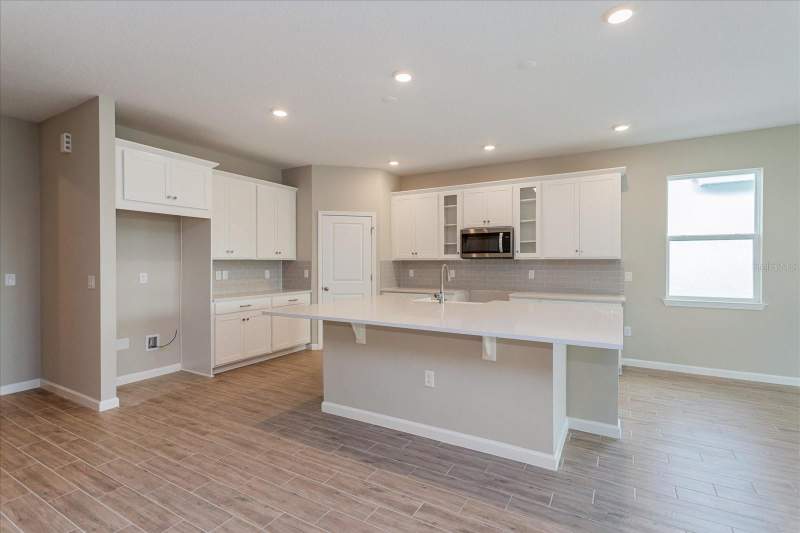 5 bedroom Single Family Residence at 6045 Flowering Cherry Bend, Avalon Woods, Winter Garden — photo 2