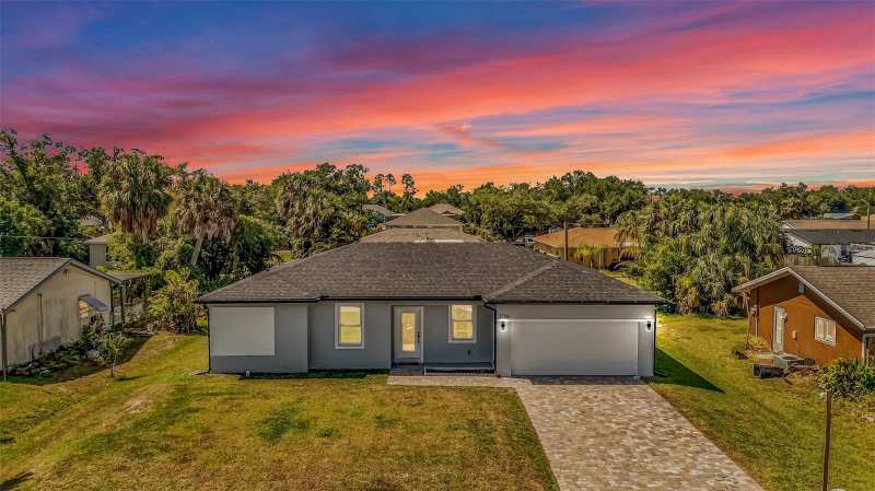 4 bedroom Single Family Residence at 22561 Alcorn Avenue, Port Charlotte Sub Sec 12, Port Charlotte — photo 1