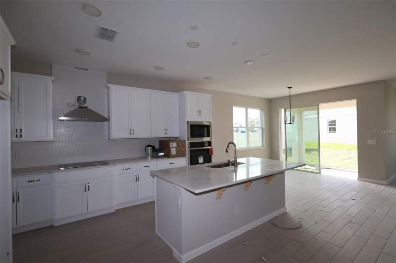 5 bedroom Single Family Residence at 6693 Yellow Warbler Bend, Bay Lake Farms At St Cloud, St Cloud — photo 4