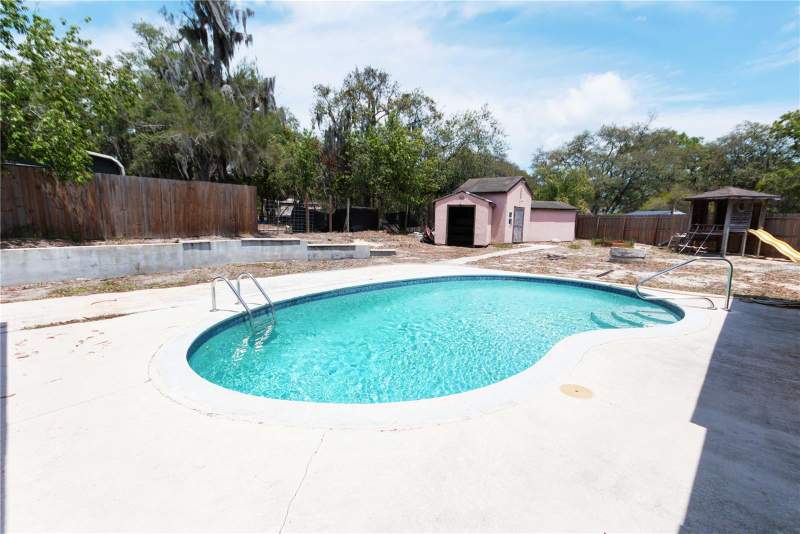 4 bedroom Single Family Residence at 9939 Woodridge Court, The Lakes, Port Richey — photo 3